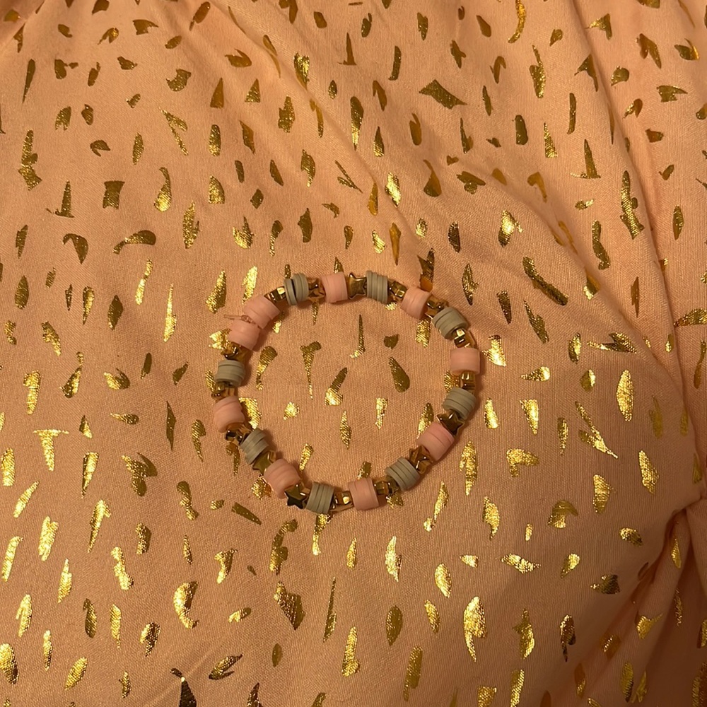 This is a clay bead bracelet called starlight night